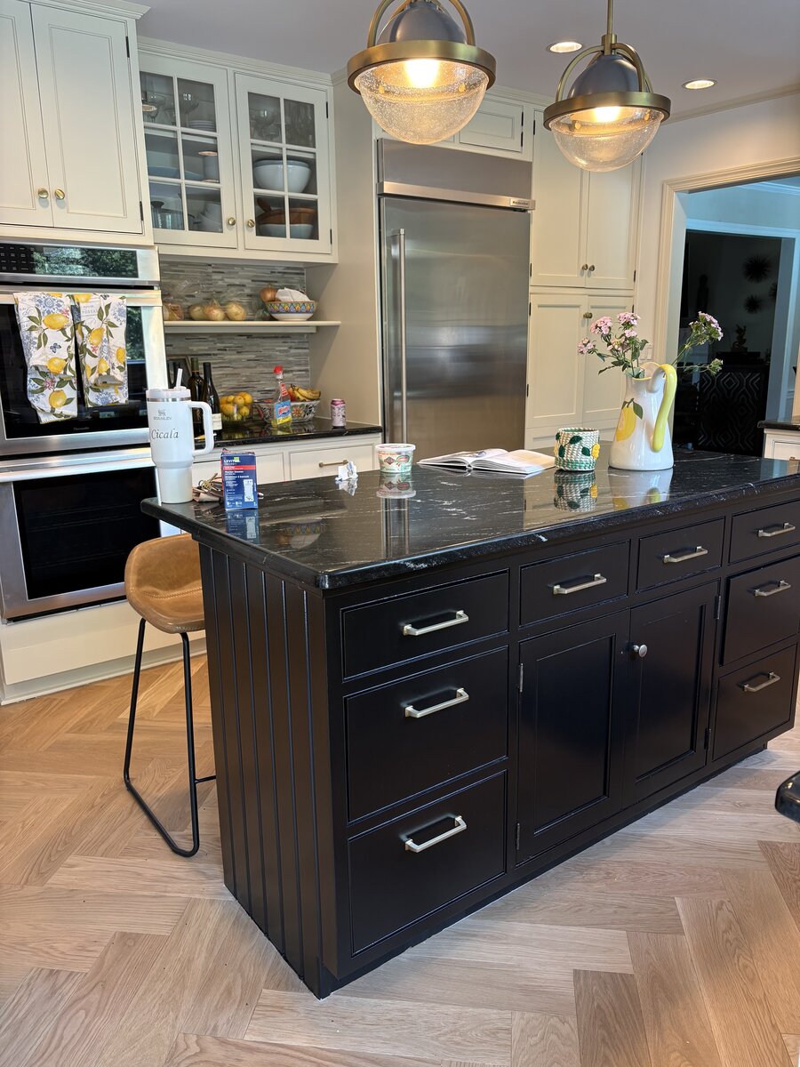Dark island cabinet refinishing with white perimeter cabinets by J&B Painting