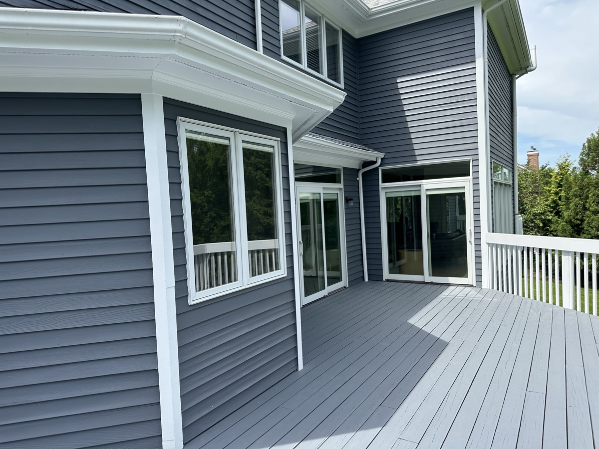 Gray painted deck with sliding glass doors by J&B Painting
