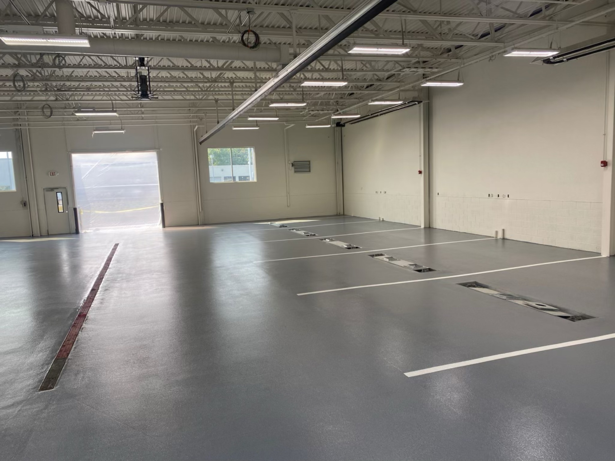 Commercial warehouse epoxy floor coating by J&B Painting